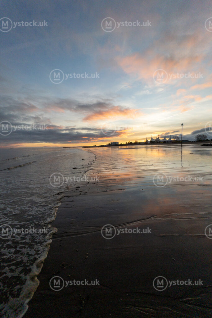 Sunrise Reflections on Minehead Beach