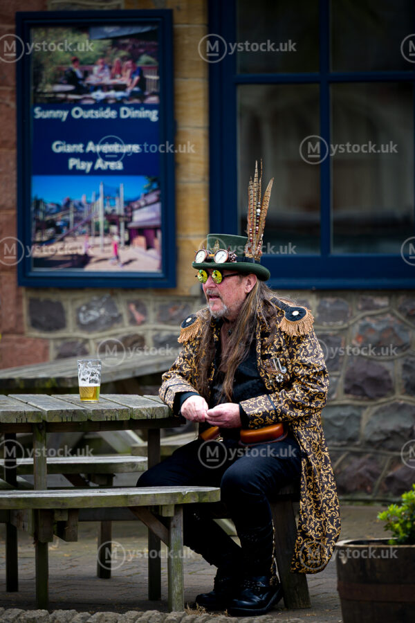 Steampunk Elegance: A Moment of Reflection at Minehead Festival