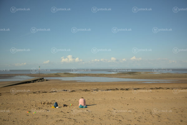 Resting by the Sea at Low Tide